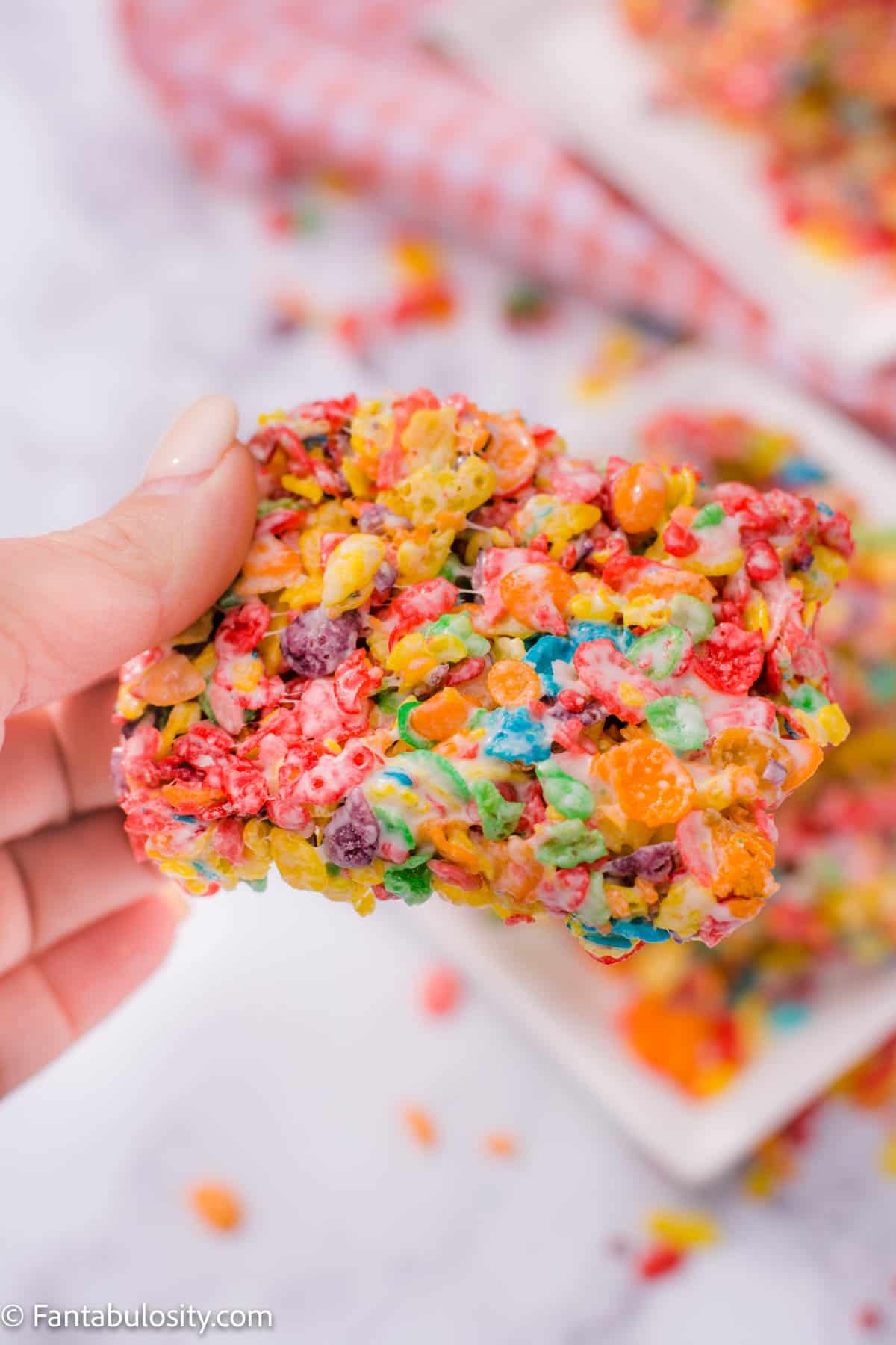 Slice Fruity Pebble treats in to squares