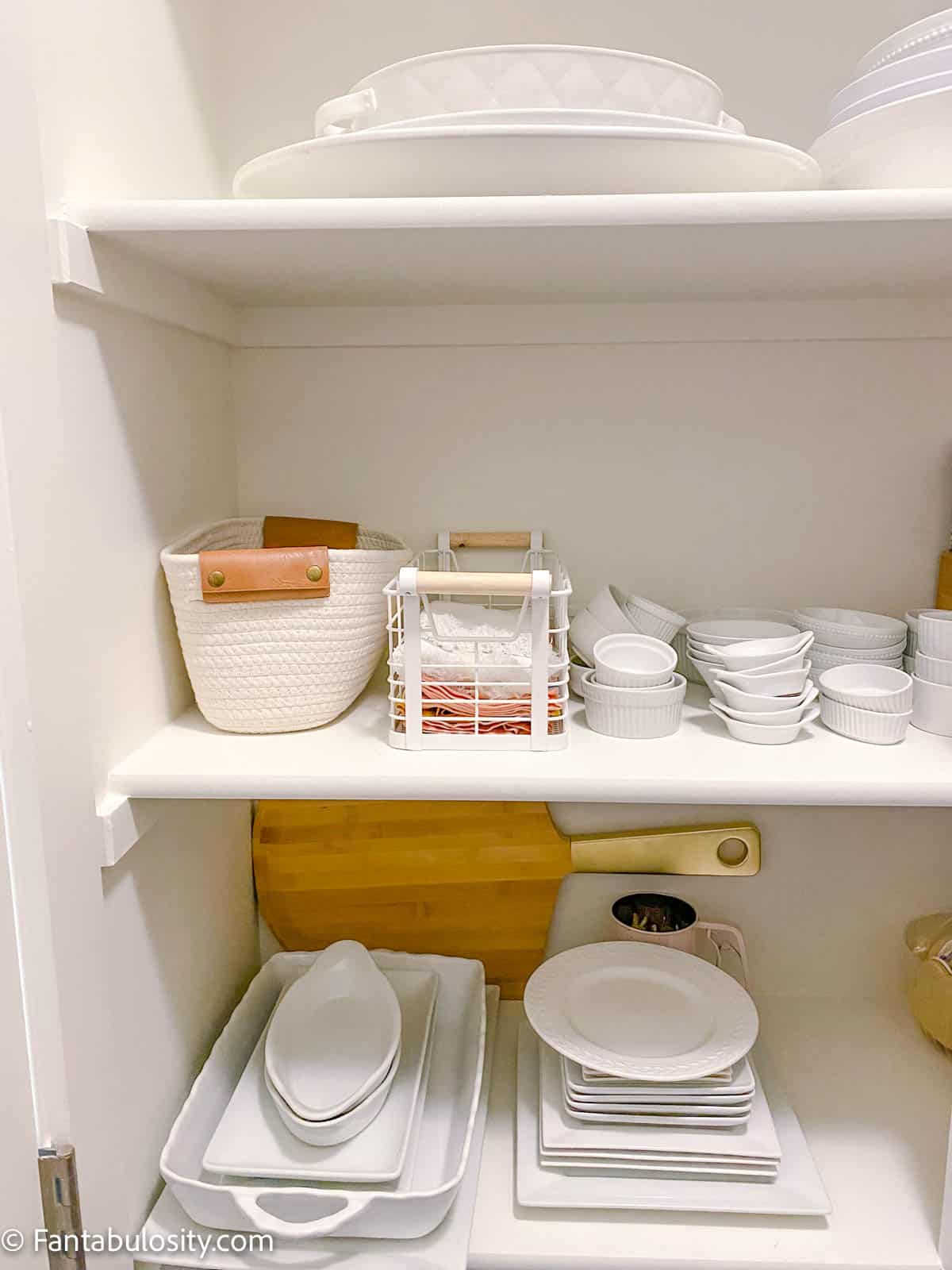 white dishes on shelves