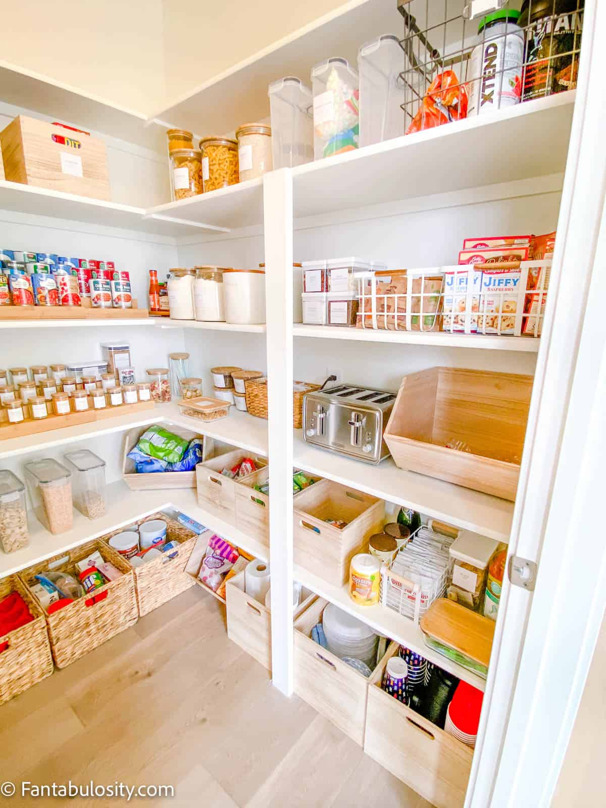 Wide angle view of white pantry organization