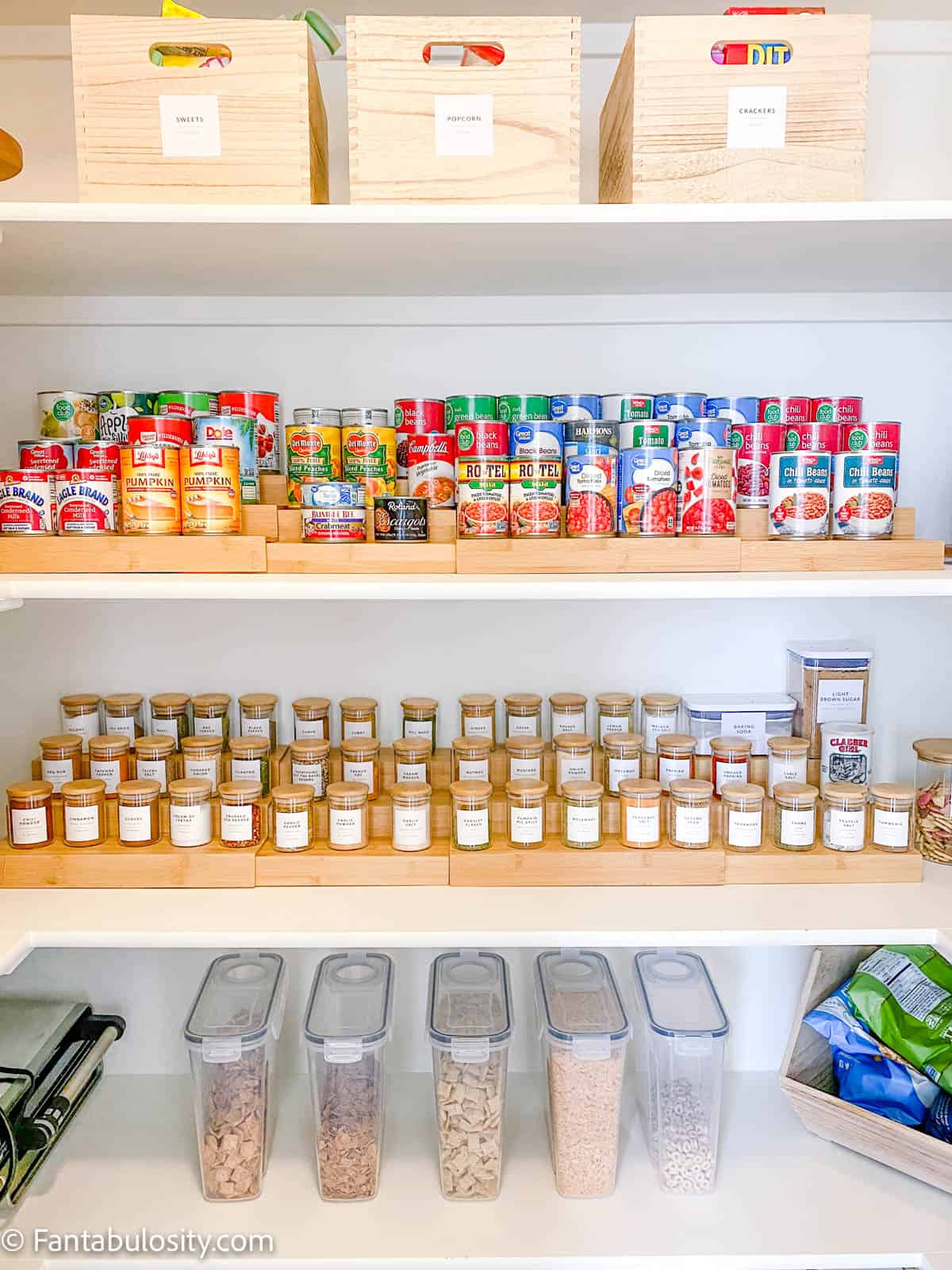 Pantry shelves with organized canned goods and spices