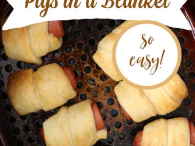 pigs in a blanket in air fryer basket with text on image