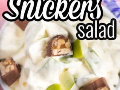 apple snickers salad in white bowl with text on image
