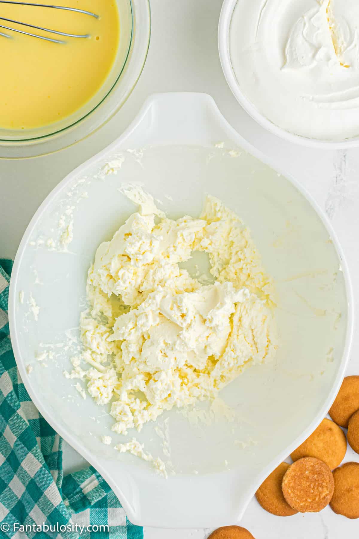 cream cheese mixed in bowl