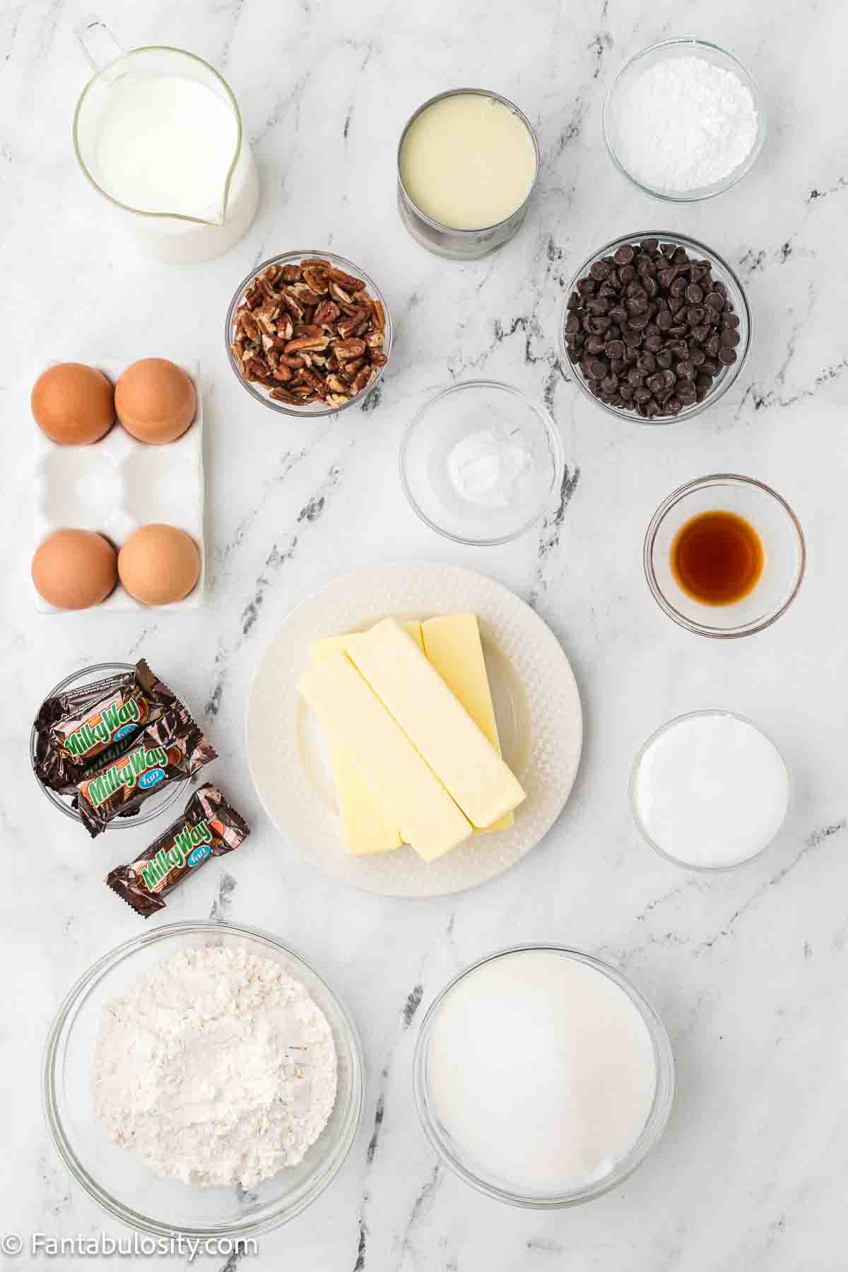 Ingredients to make Milky Way cake on kitchen counter.