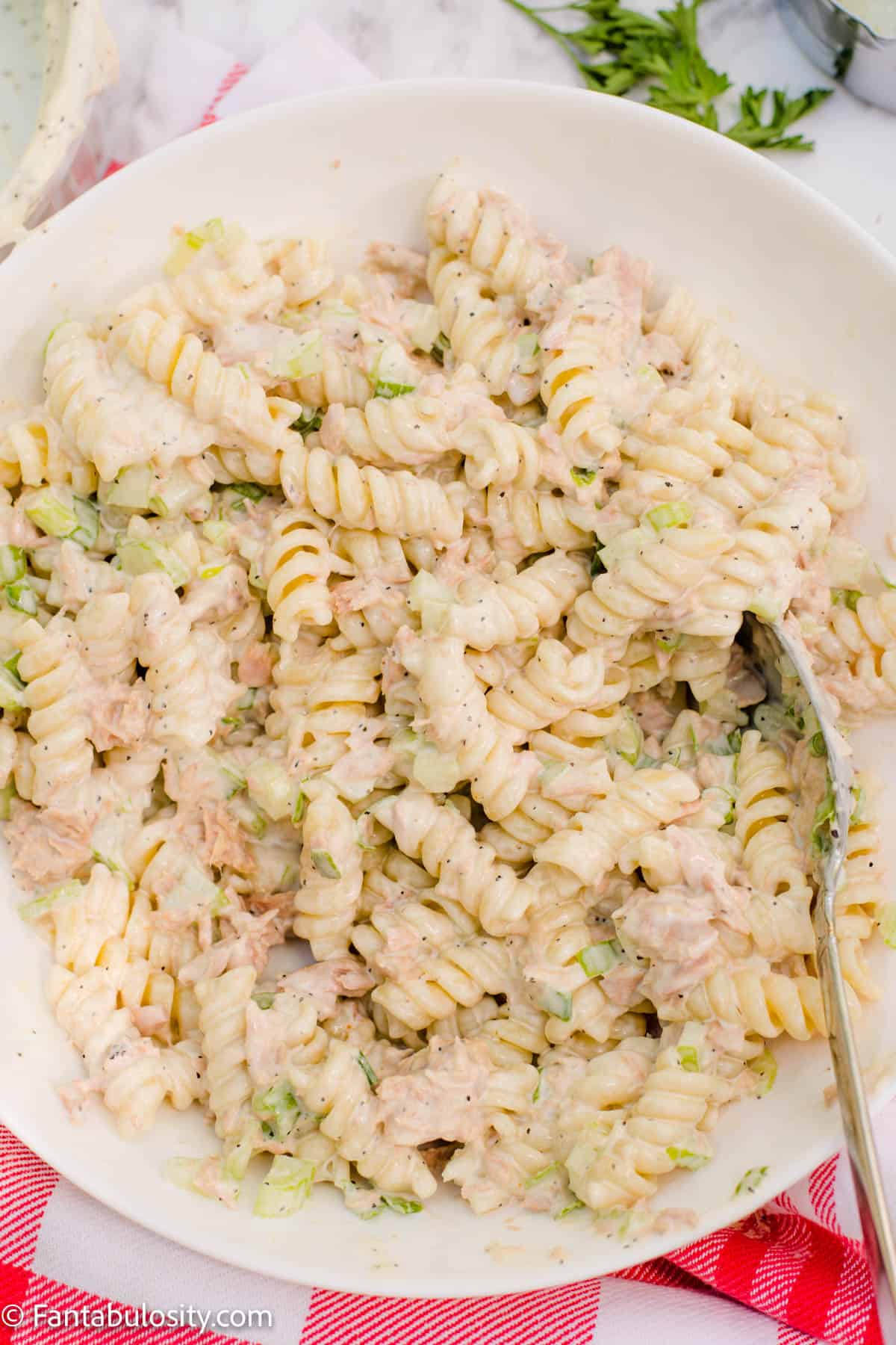 Pasta mixed with mayo and vegetables