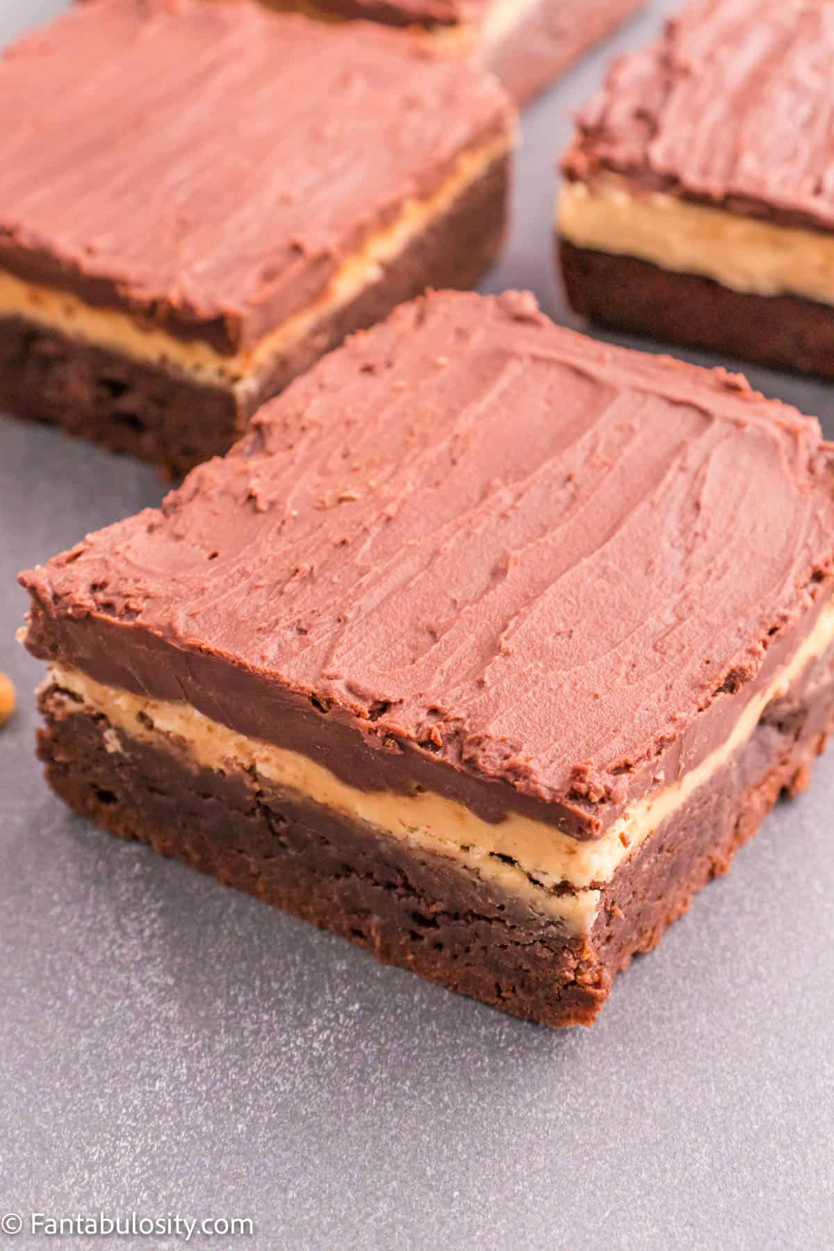 Squares of chocolate peanut butter brownies.