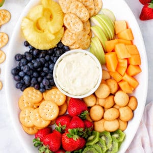 fruit board with crackers and dip