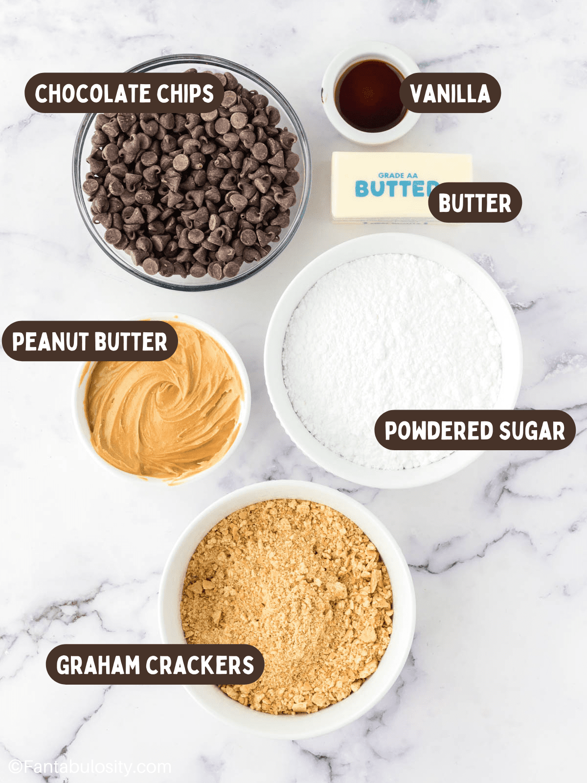 The ingredients for no bake chocolate peanut butter bars with labels on them. 