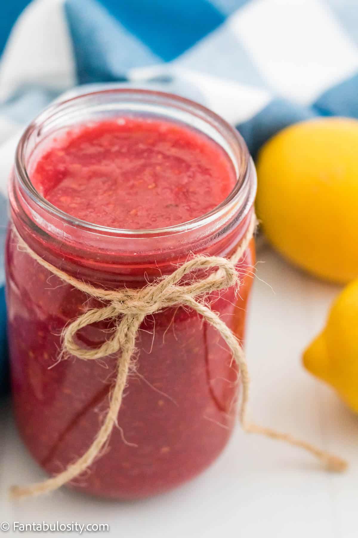 Instant Pot raspberry jam fills a mason jar