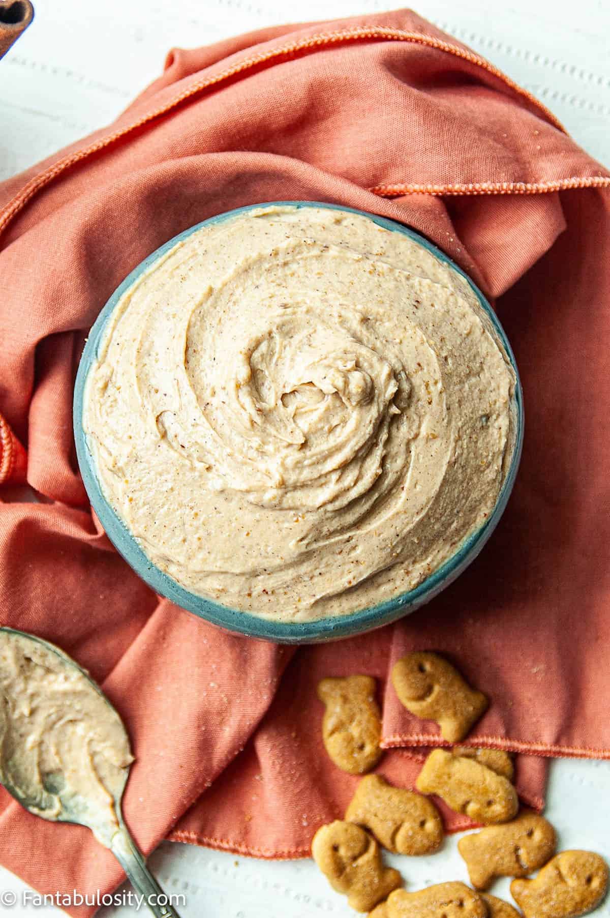 A bowl of peanut butter yogurt dip.