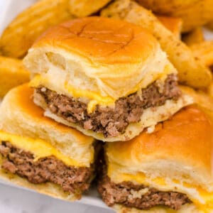 stack of cheeseburger sliders with hawaiian buns