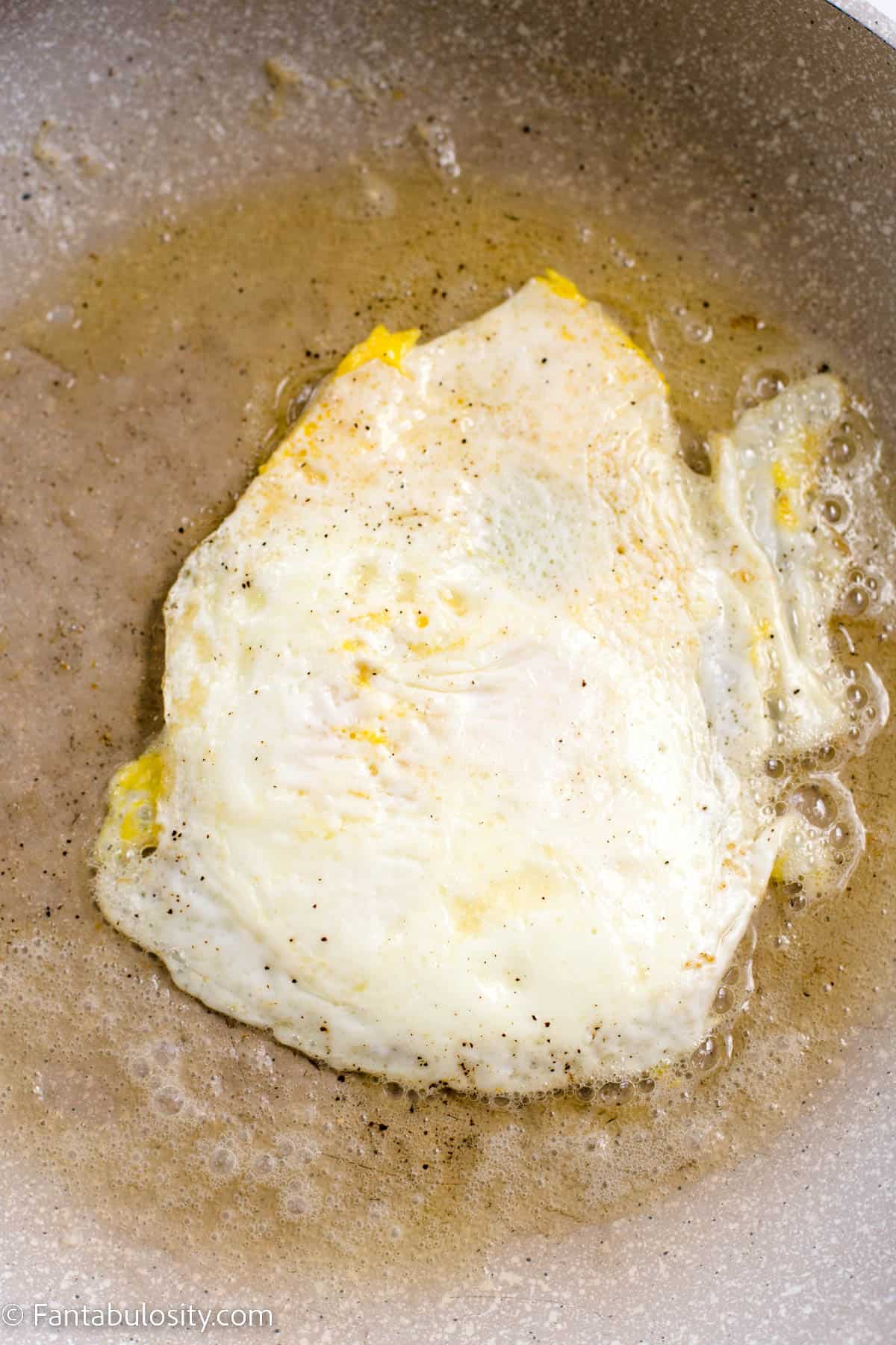 Egg that has been flipped in skillet