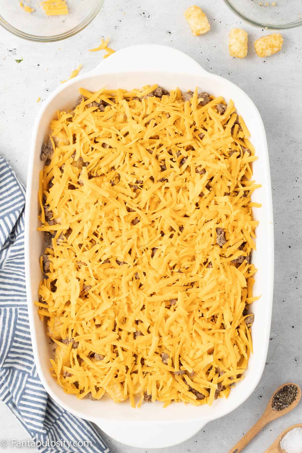 Cheese sprinkled on baking dish