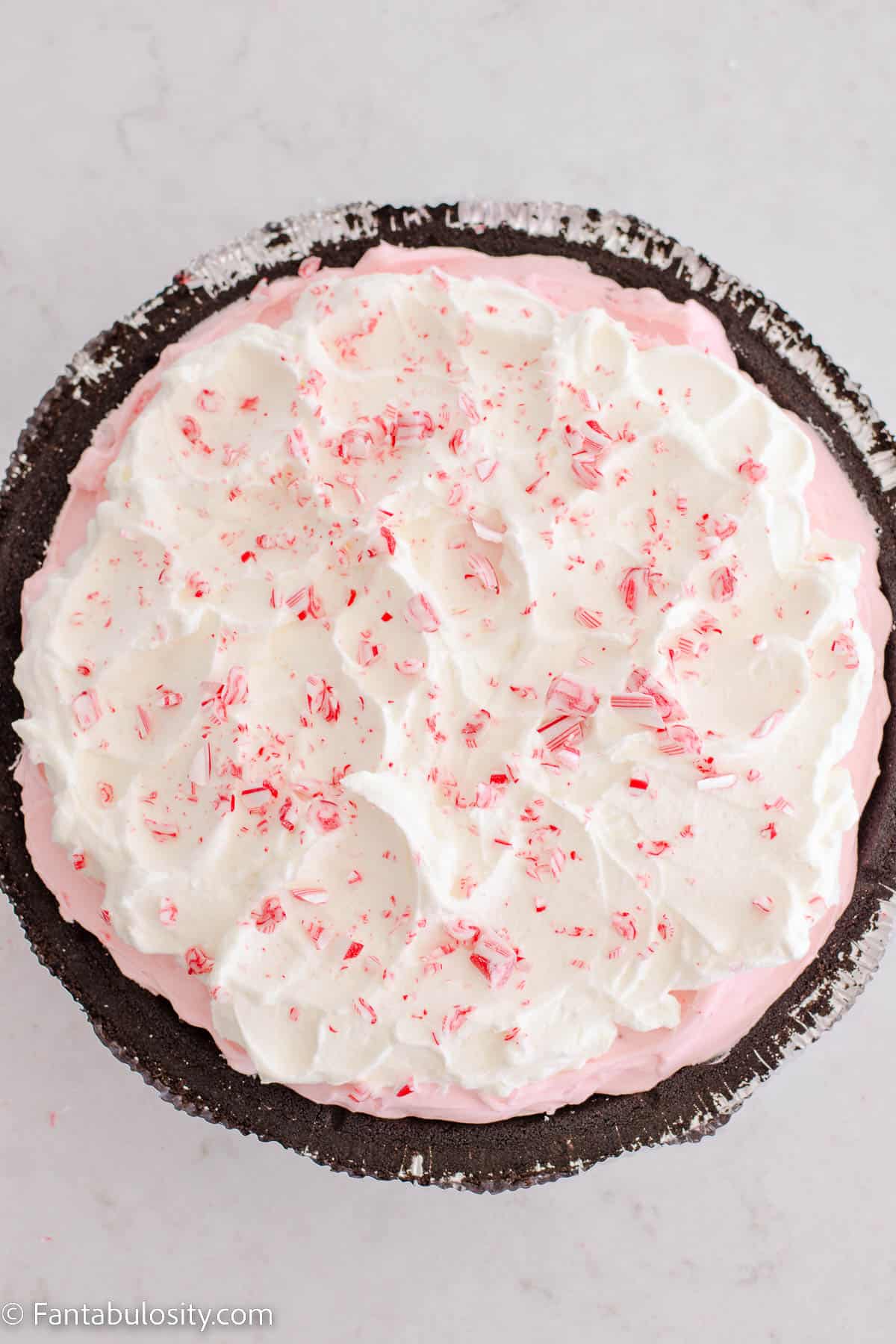 Crushed candy canes sprinkled on pie