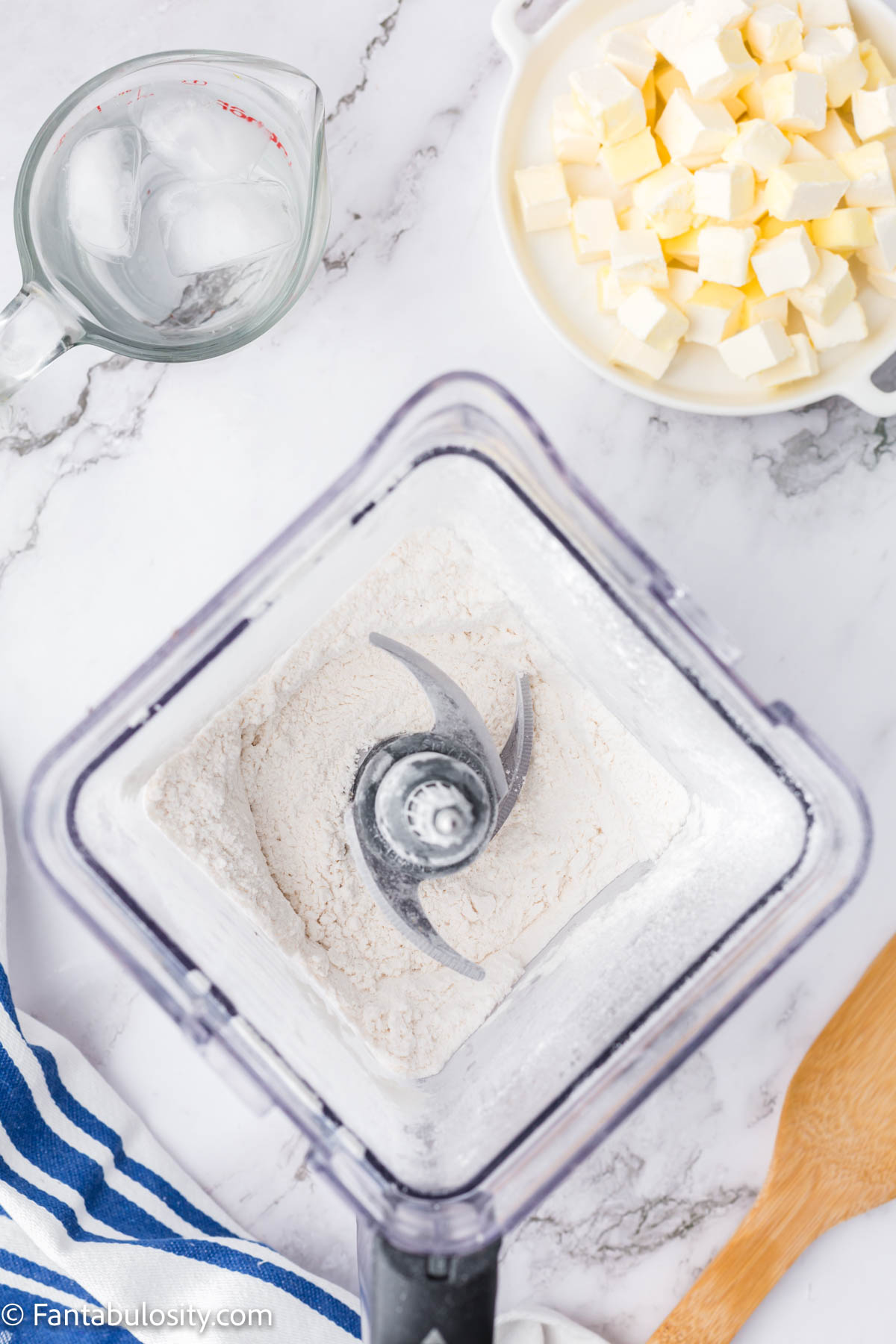 Flour, sugar, and salt in a food processor