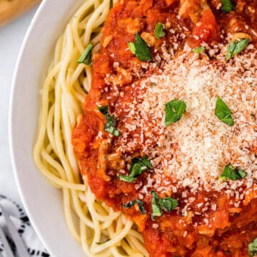 Chicken Bolognese on spaghetti noodles.