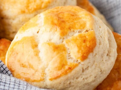 Homemade buttermilk biscuits with text on the image.