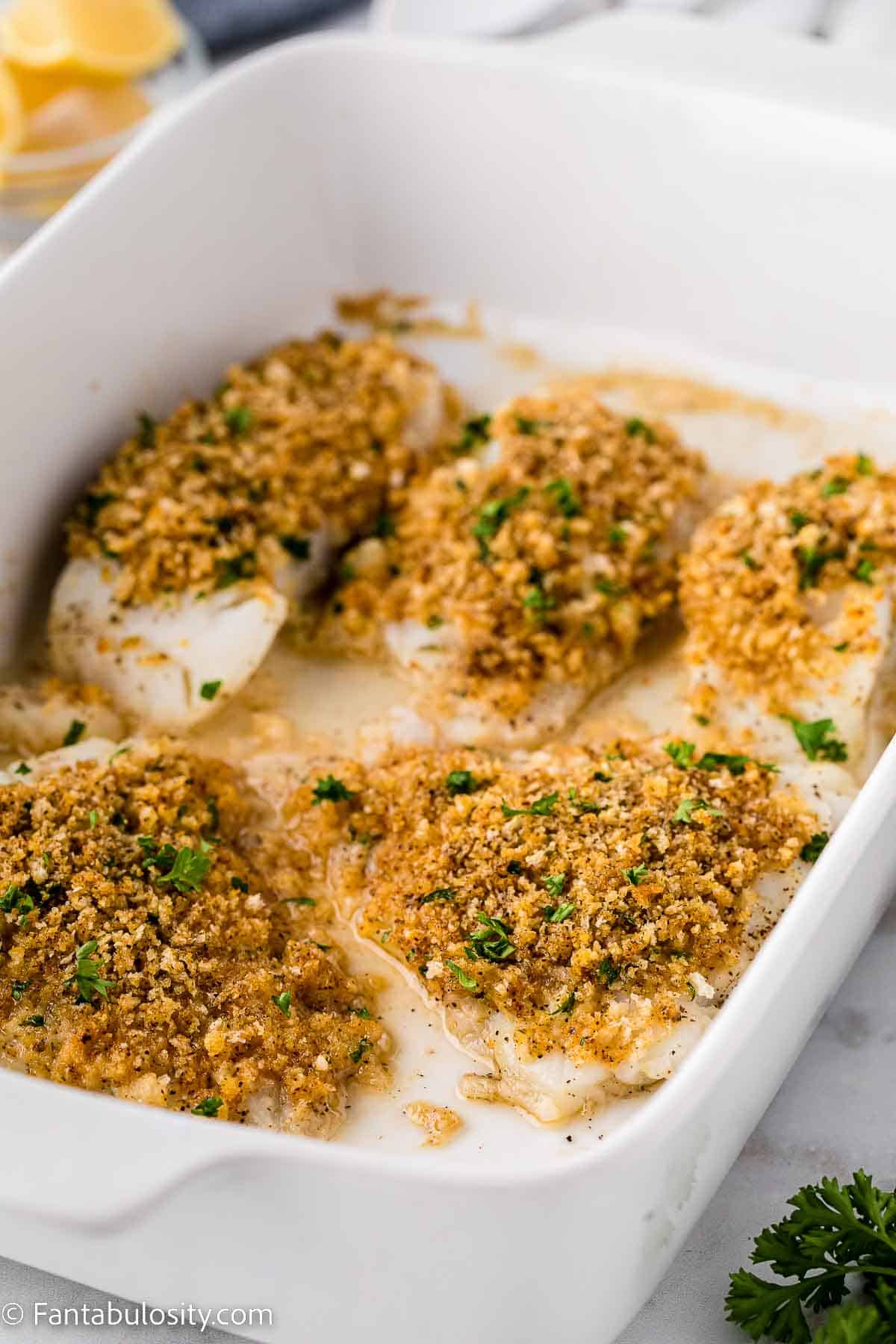 Baked cod filets with panko crusted seasoning.