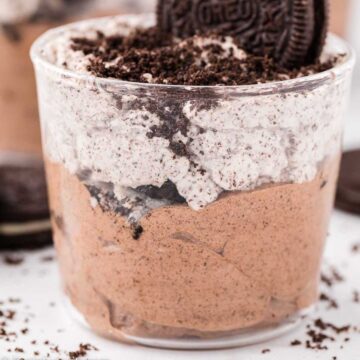 Oreo mousse in a clear glass single serving container.