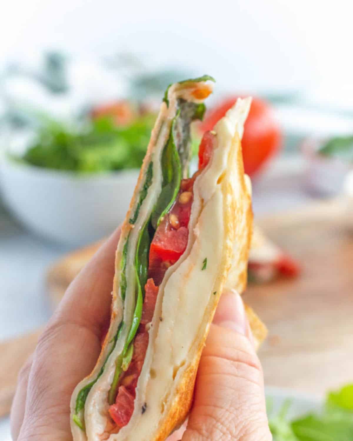 Mozzarella wrap with tomato and basil.