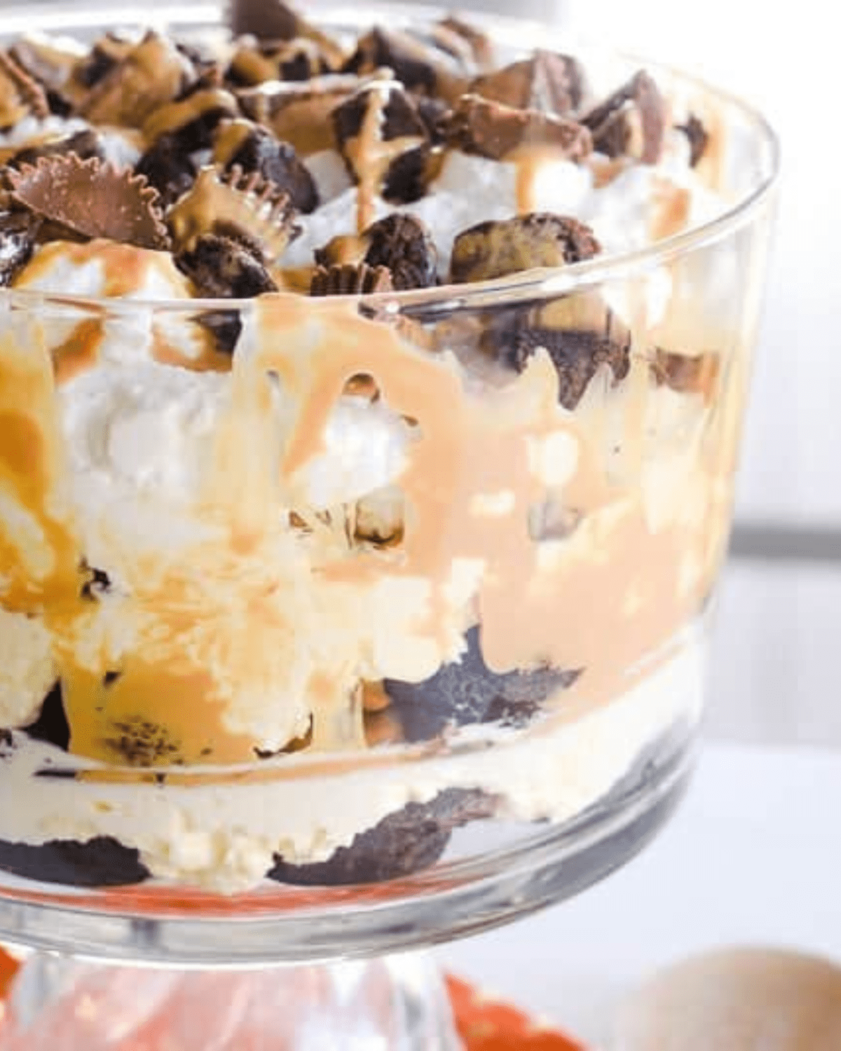 Peanut butter cup brownie trifle in a glass bowl