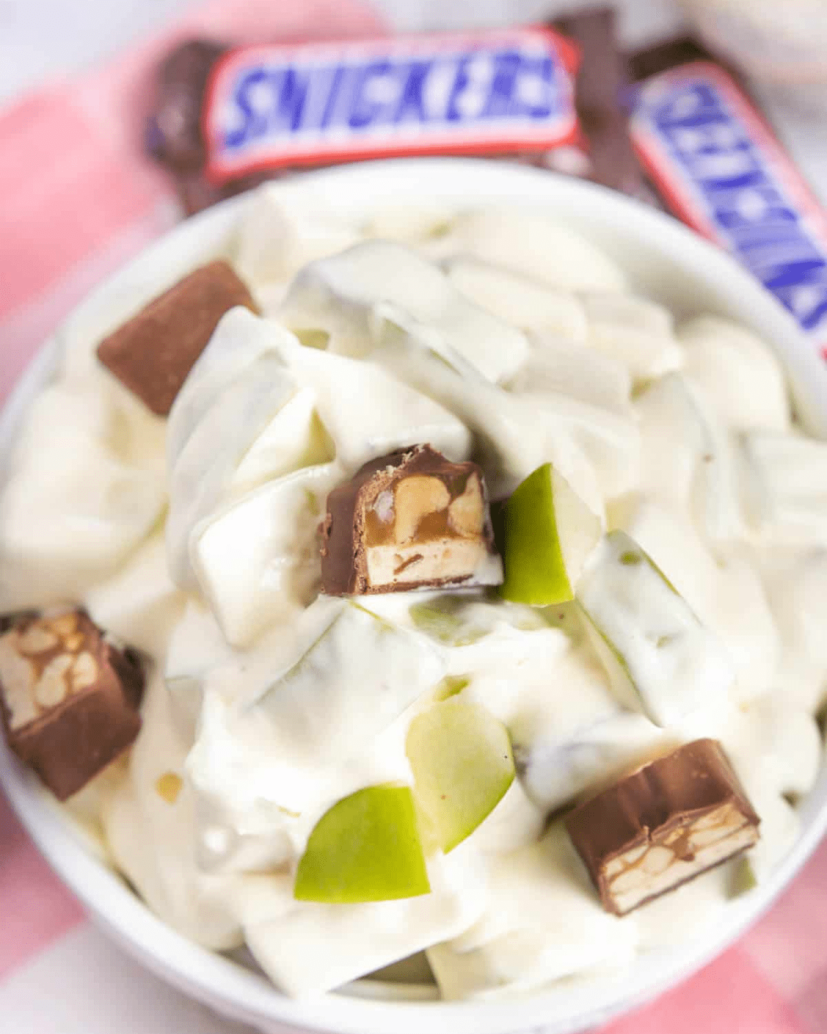 Snickers salad with apples and mini candy bars

