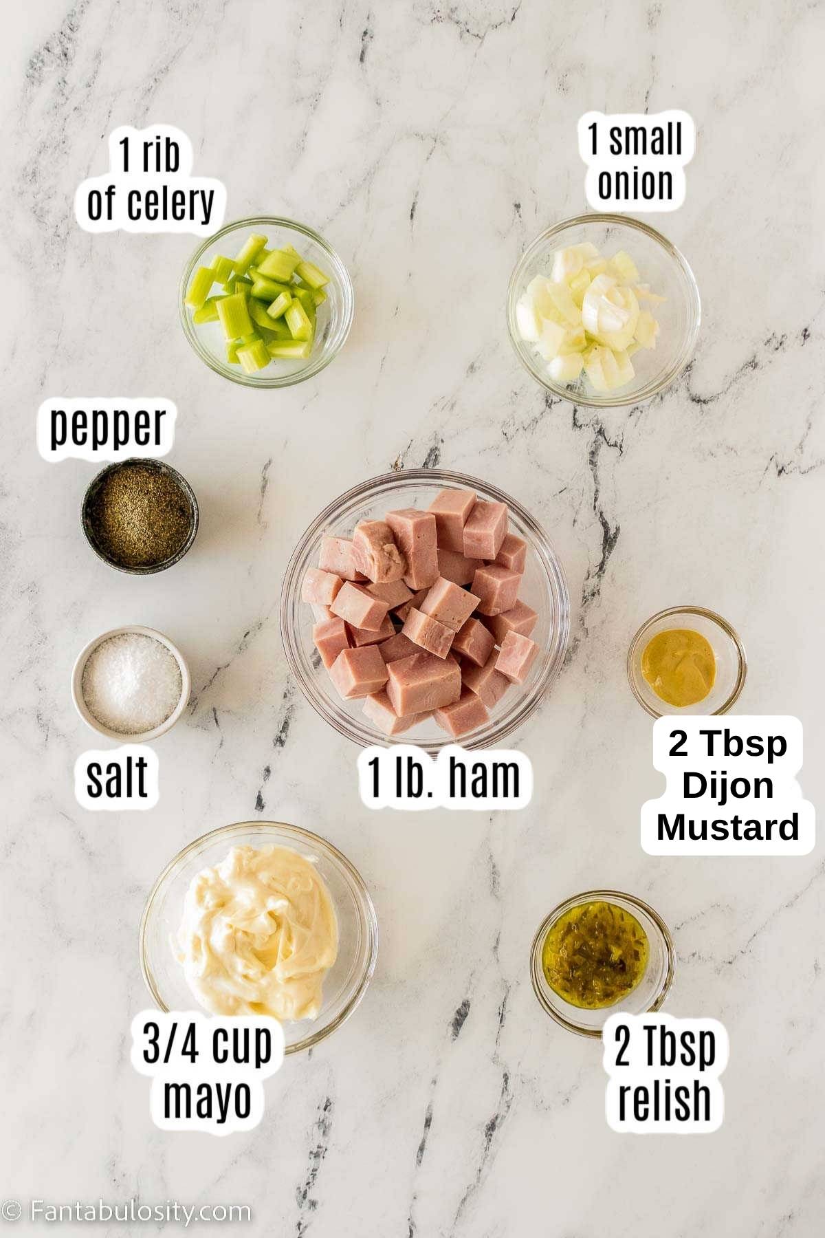 Ingredients to make ham salad recipe on counter.