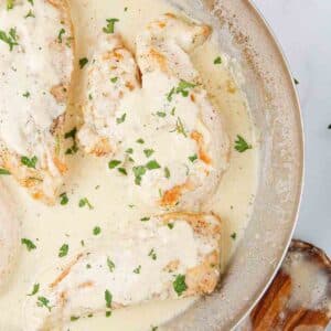 Creamy Caesar Chicken in a skillet.