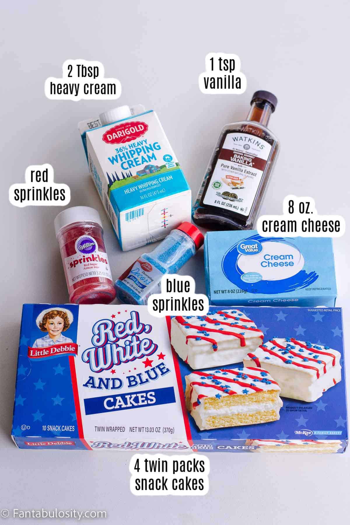 Labeled ingredients for red white and blue dip on white counter.