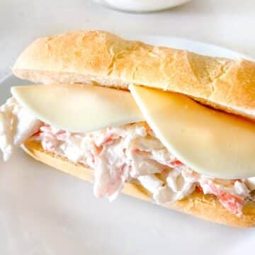 Subway Crab Sandwich on white plate.