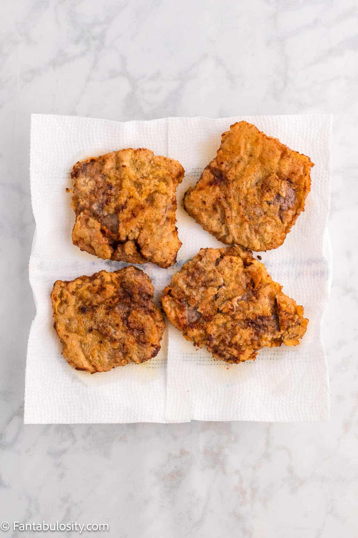 Cracker Barrel Country Fried Steak on paper towels.