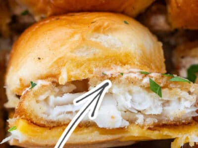 Close up of fish slider on Hawaiian bun, with Old Bay sauce.
