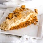 No Bake Biscoff Pie on white plate.