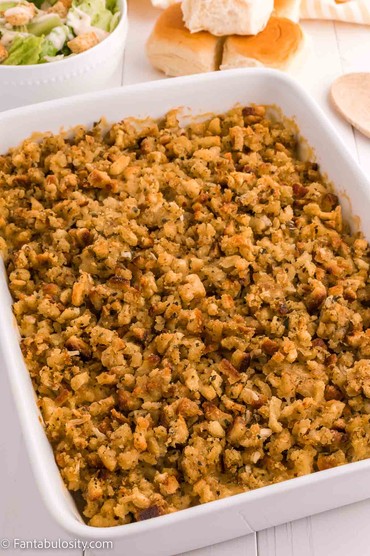 Baked Stove Top Stuffing Chicken Casserole in white baking dish on white counter.