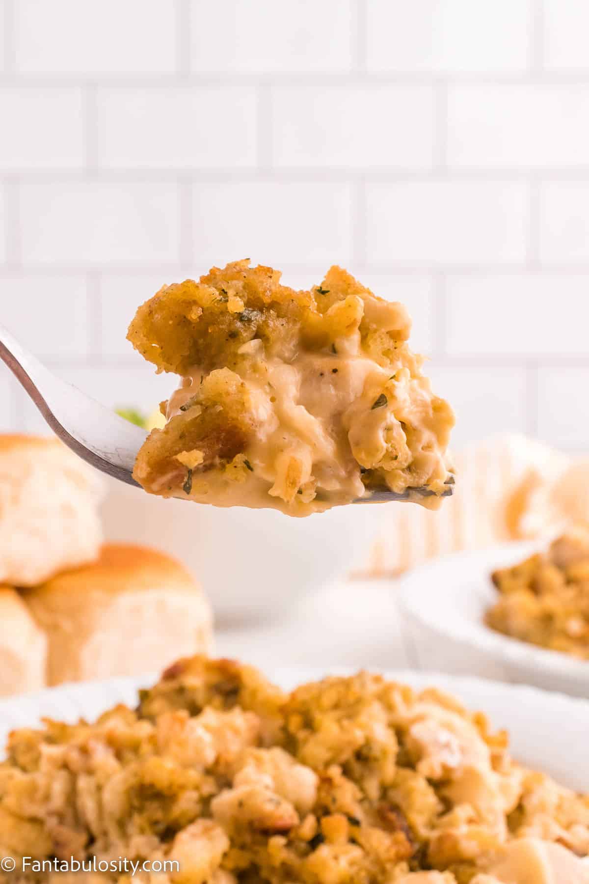 A bite of Stove Top Stuffing Chicken Casserole on fork.