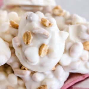 White chocolate crock pot candy on fabric napkin.