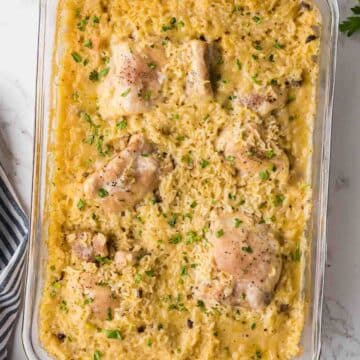 Baked chicken and rice casserole in baking dish.