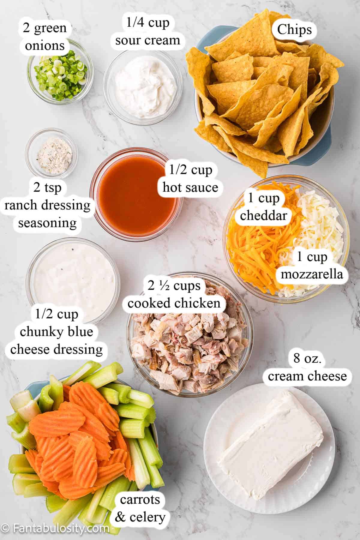 Labeled ingredients for a buffalo chicken dip recipe.