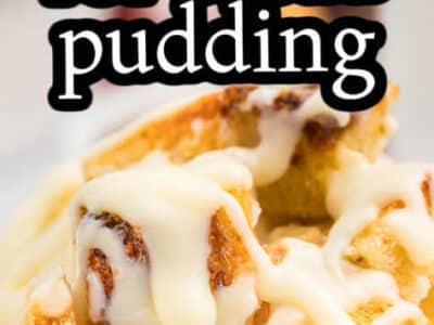 Vanilla sauce drizzled on top of a bread pudding in a white dish.