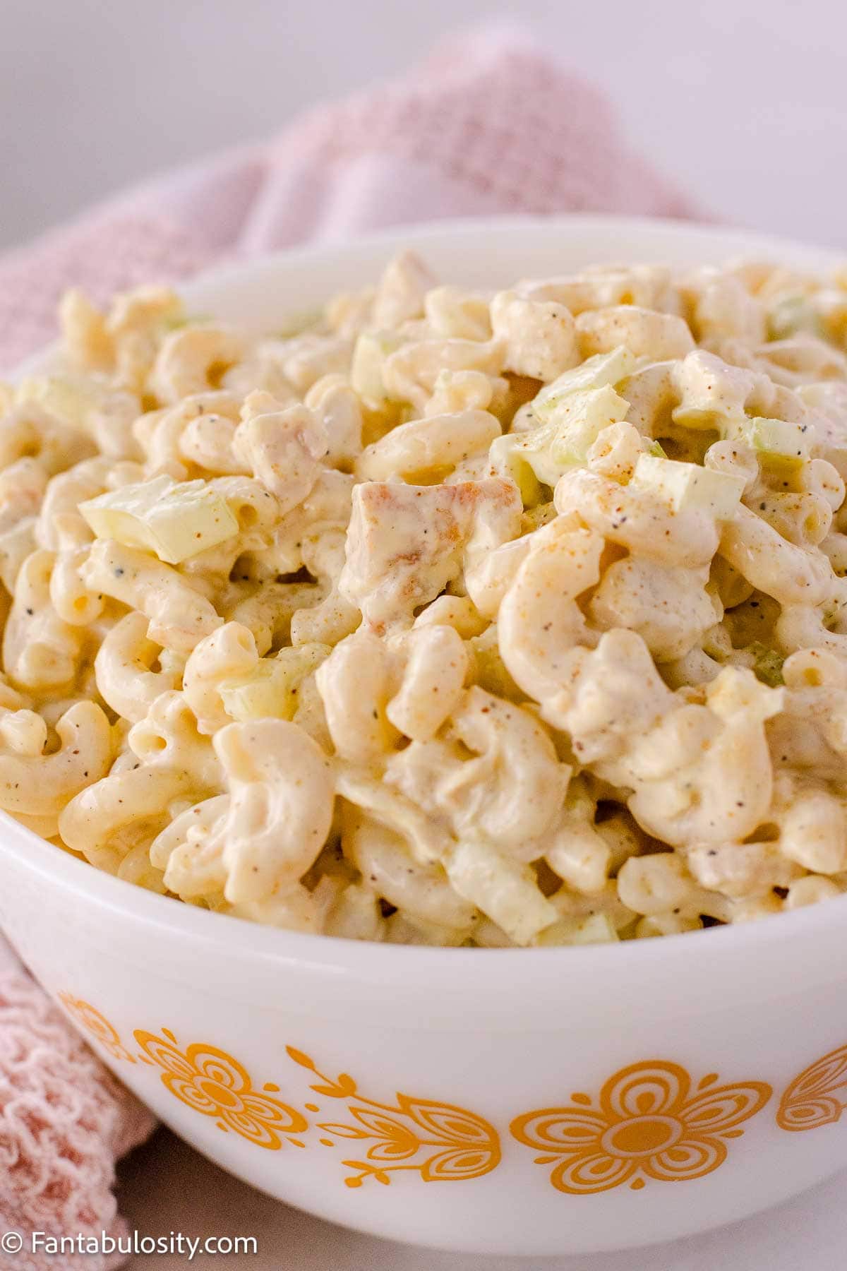 Chicken macaroni salad in serving bowl.