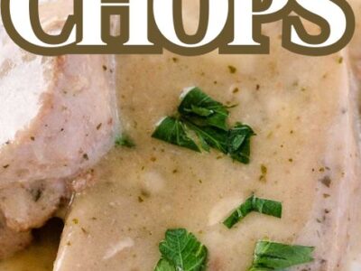 Pork chops cooked in the crock pot covered with gravy.