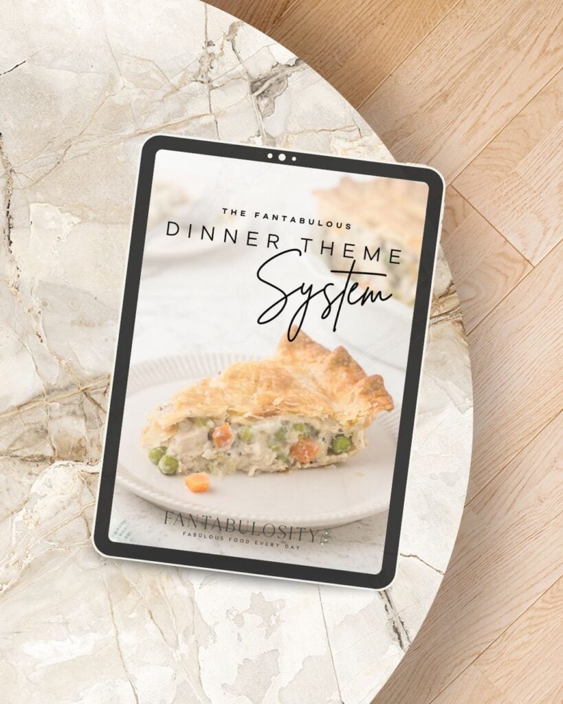 Mockup of the Dinner Theme Night System cover on a tablet.