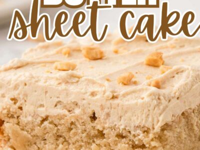 Slice of peanut butter sheet cake with peanut butter icing on a plate.