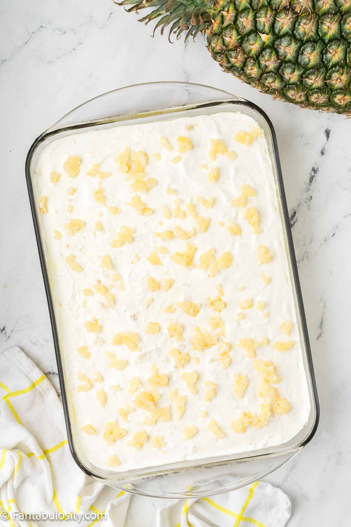 Pineapple on top of pineapple sunshine cake.