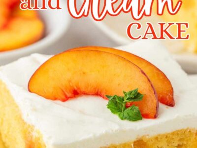 Slice of peaches and cream cake on a plate, with fresh peaches on top.