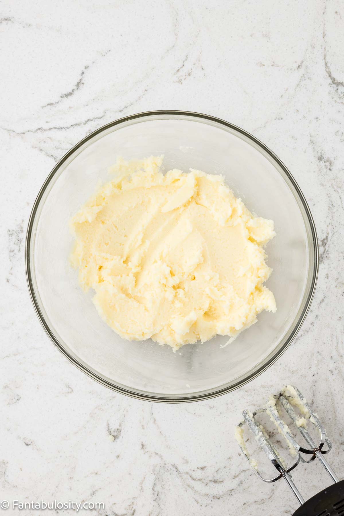 Creamed butter and sugar in mixing bowl.