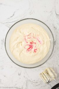 Dry and wet ingredients mixed together and pink food coloring mixed in.