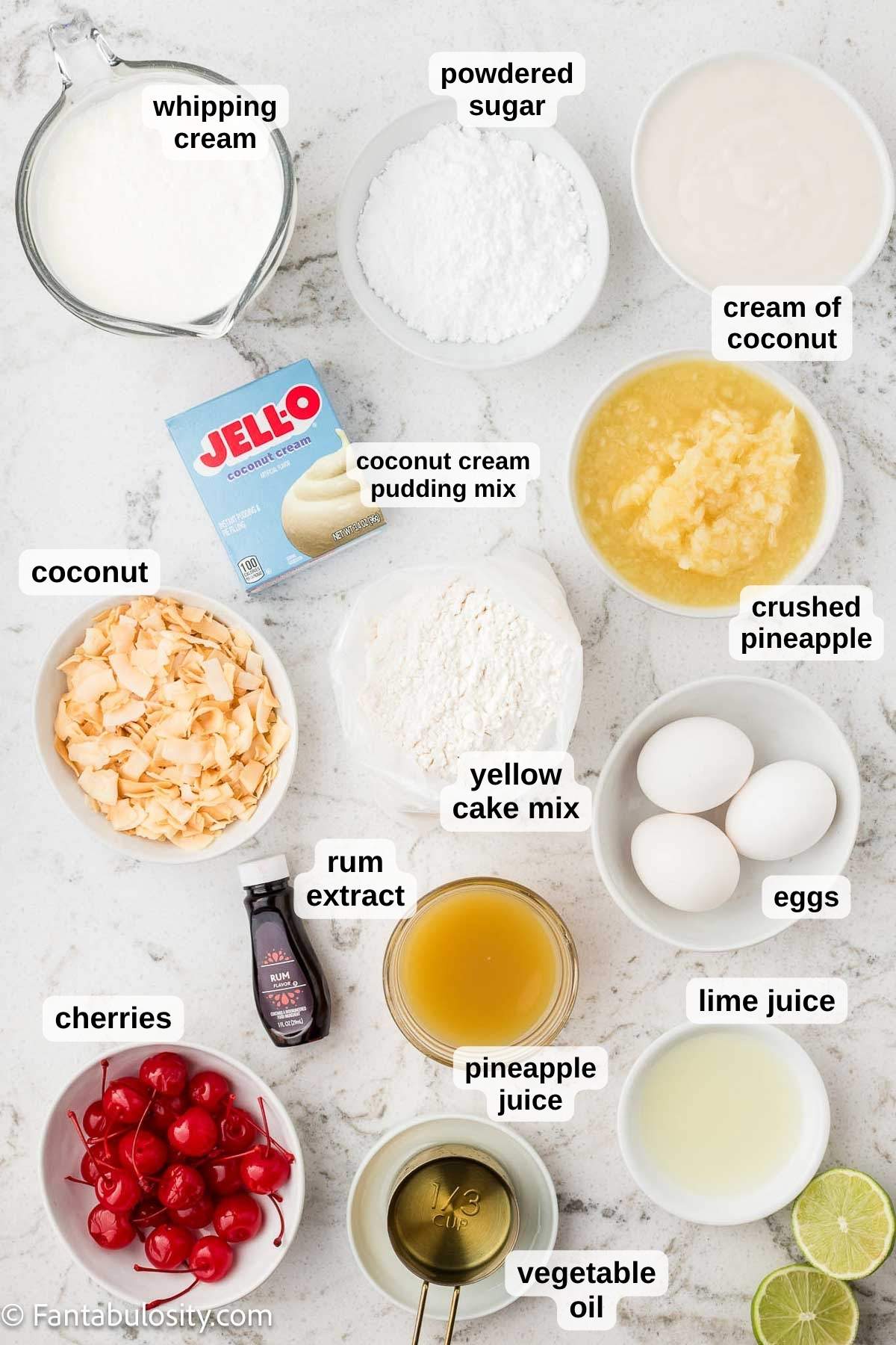 Labeled ingredients for pina colada cake sitting on counter.