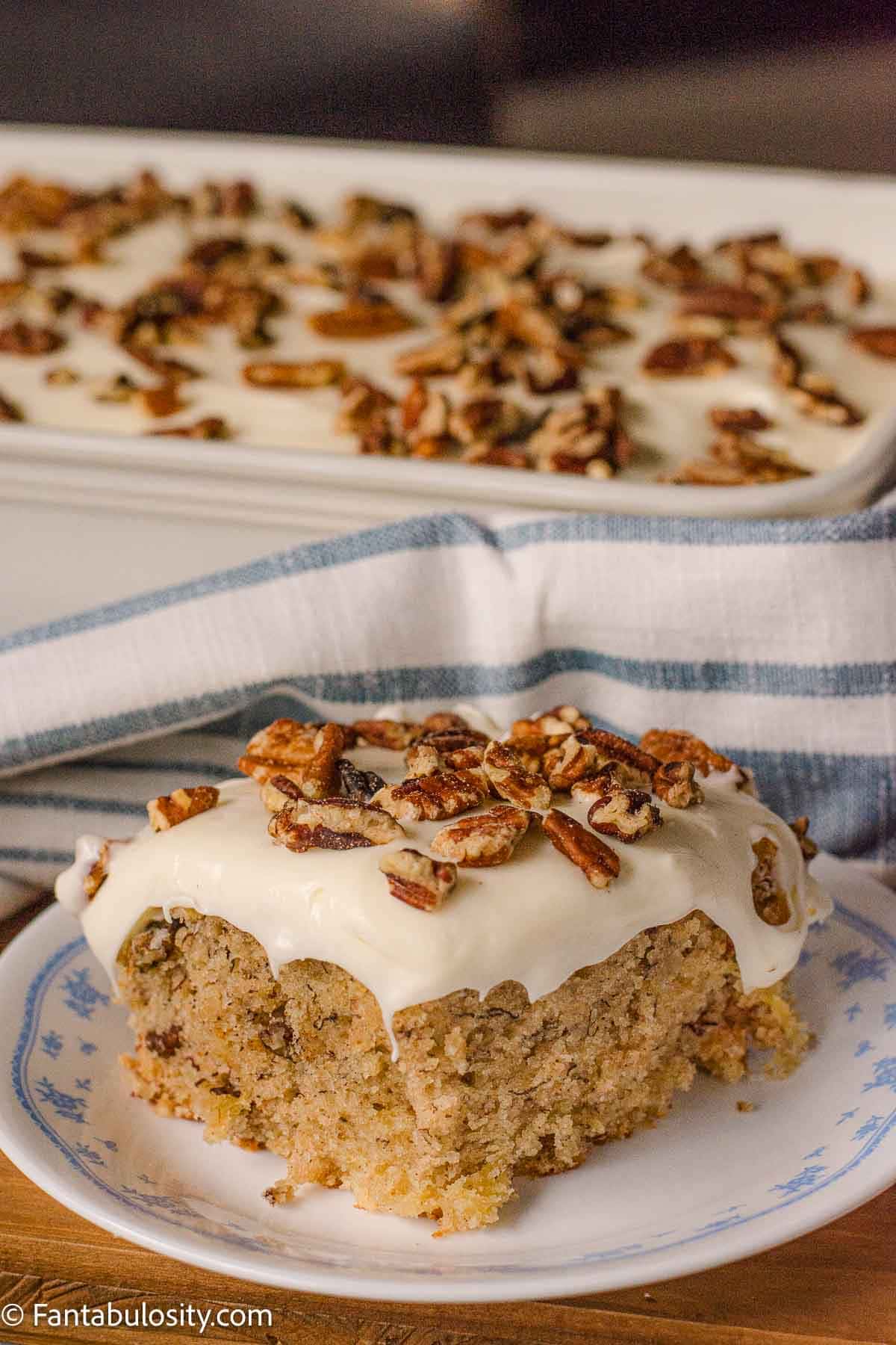 A slice of Hummingbird cake on a vintage plate.