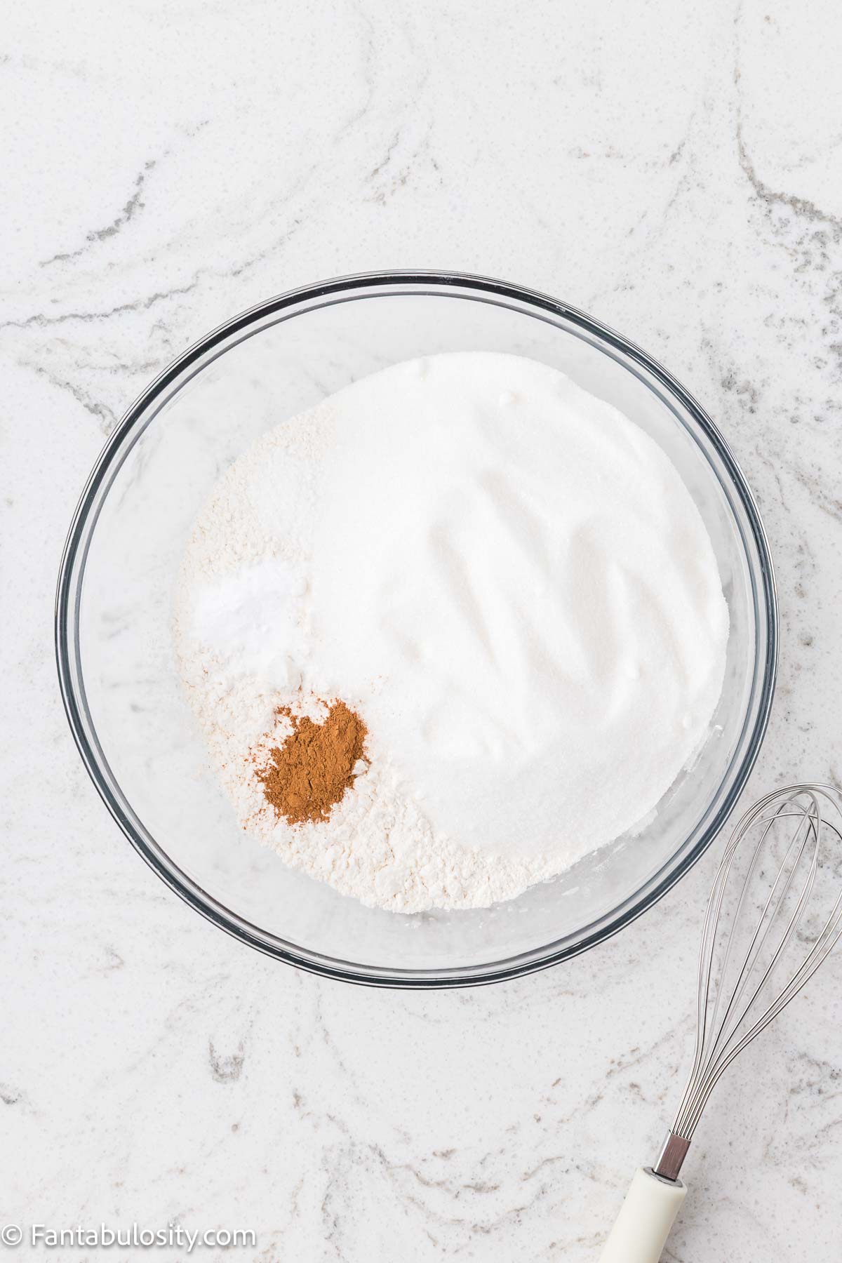 Flour, sugar, cinnamon, baking soda, and salt in mixing bowl.